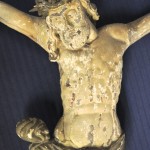 Een Christus van gesculpteerd lindehout. XIXe eeuw.