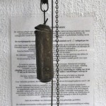 Een koperen lantaarnklok met slinger en gewichten. XIXe eeuw.