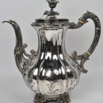 Een vierdelige zilveren koffie- en theestel. Belgische keuren. 950 ‰. Periode 1831 - 1868. Kleine beschadiging.