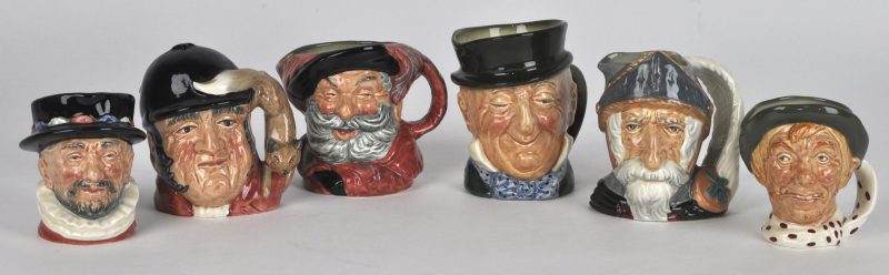 Een serie van zes “Character jugs” van meerkleurig aardewerk.