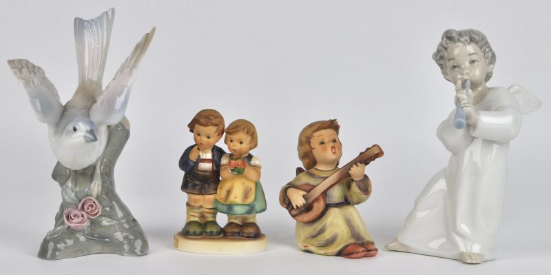 Een lot porselein en aardewerk, bestaande uit een zingend engeltje en een groepje van een jongetje en een meisje van Goebel, een engeltje met fluit van Lladro en een porseleinen vogeltje.