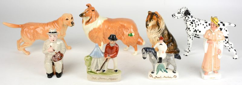 Een lot meerkleurig aardewerk, bestaande uit vier honden, waarvan twee van Royal Doulton en één van Beswick, en schilderende Churchill, enz.