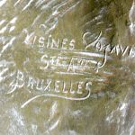 “La folle chanson”. Een groep van groengepatineerd brons. Met Brussels gieterijmerk.