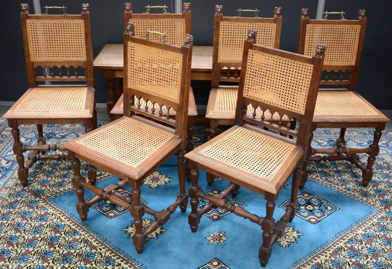 Serie van zes eikenhouten stoelen met rieten zit. Omstreeks 1900.