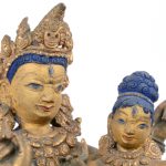 Een Hindoeïstisch godsbeeld van deels blauwgepatineerd brons.