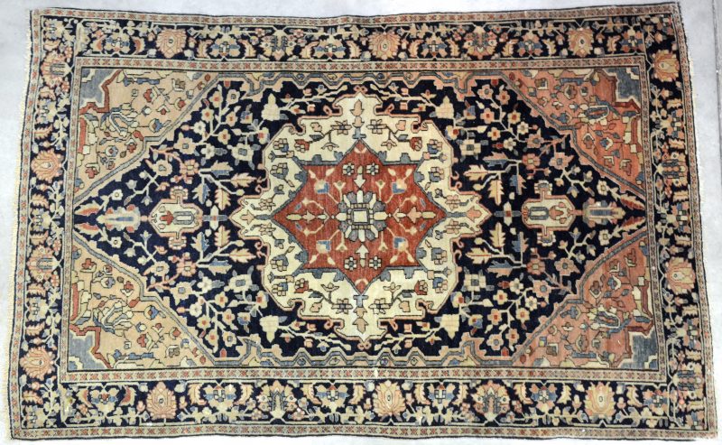 “Een handgeknoopt Perzisch wollen karpet.