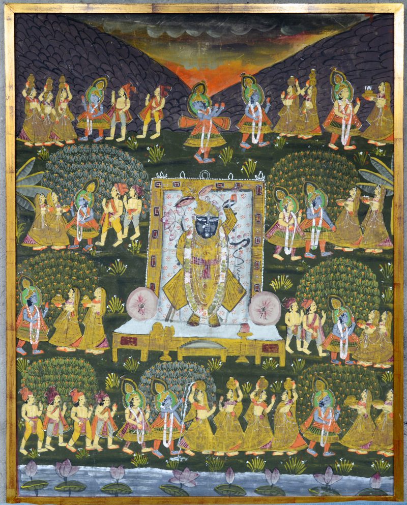Een Indische tangka op zijde met een voorstelling van Krishna.