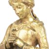 “La prière”. Een bronzen beeld met gouden patina. Gesigneerd.