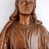 “Johannes de evangelist”. Een gebeeldhouwd heiligenbeeld met hangconsole.