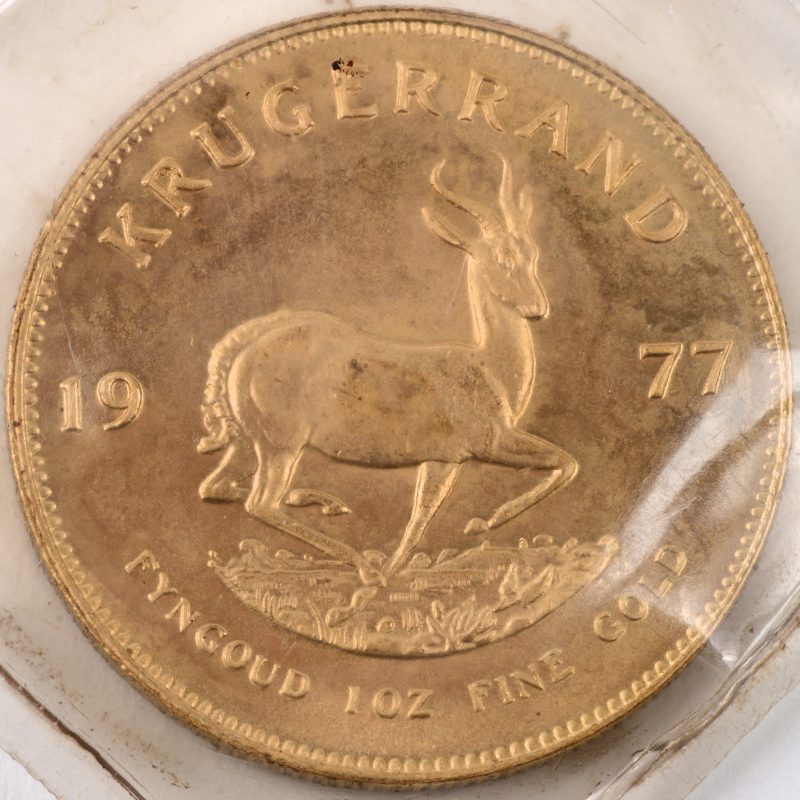 “Krugerrand”. Een 22 karaats geel gouden munt. Zuid-Afrika. 1977. Fine gold. 1 0Z. In afgesloten hoesje.