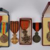 Een lot van zes medailles en vijf brevetten uit de Eerste Wereldoorlog.