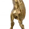 “Mensenfiguur met vogelkop”. Een bronzen beeldje op rood marmeren sokkel.