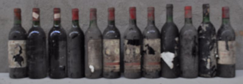 Lot rode wijn        aantal: 12 Bt. BN, zeer vuile en beschadigde etikettenMarquès de Murrieta Rioja D.O.       aantal: 1 Bt. Hauterive A.C. Médoc   M.O.  1978  aantal: 2 Bt. Ch. Quimper A.C. Haut-Médoc   M.O.  1978  aantal: 1 Bt. Rode bordeaux zonder etiket        aantal: 2 Bt. Porte du Roy A.C. St-Emilion grand cru   M.P.  1985  aantal: 3 Bt. Spaanse wijn zonder etiket        aantal: 2 Bt. Ch. Austerlitz A.C. Saint-Emilion   M.C.  1979  aantal: 1 Bt.