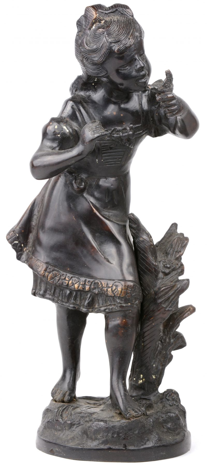 “Het getemde vogeltje”. Een bronzen beeld met donker patina. Naar een werk van Moreau.