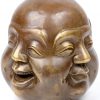 Een bronzen Boeddhahoofd met vier gezichten. Onderaan gemerkt.