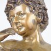 “Bloemenmeisje”. Een bronzen beeld naar een werk van Moreau.