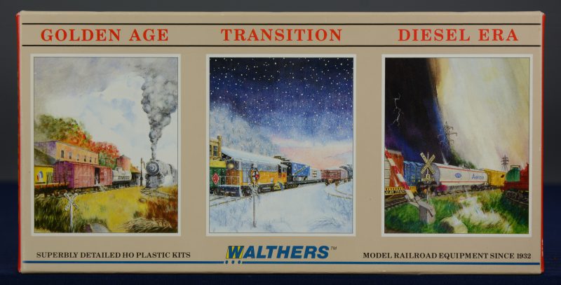 Drie platte goederenwagons van Pennsylvania Railroad.