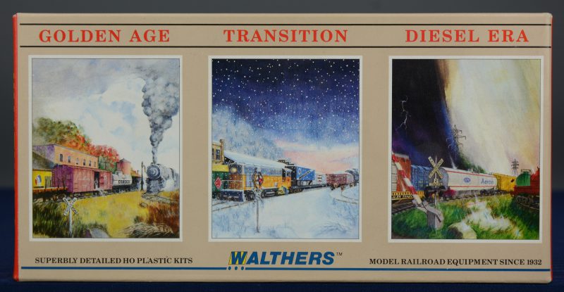 Drie platte goederenwagons van Pennsylvania Railroad.