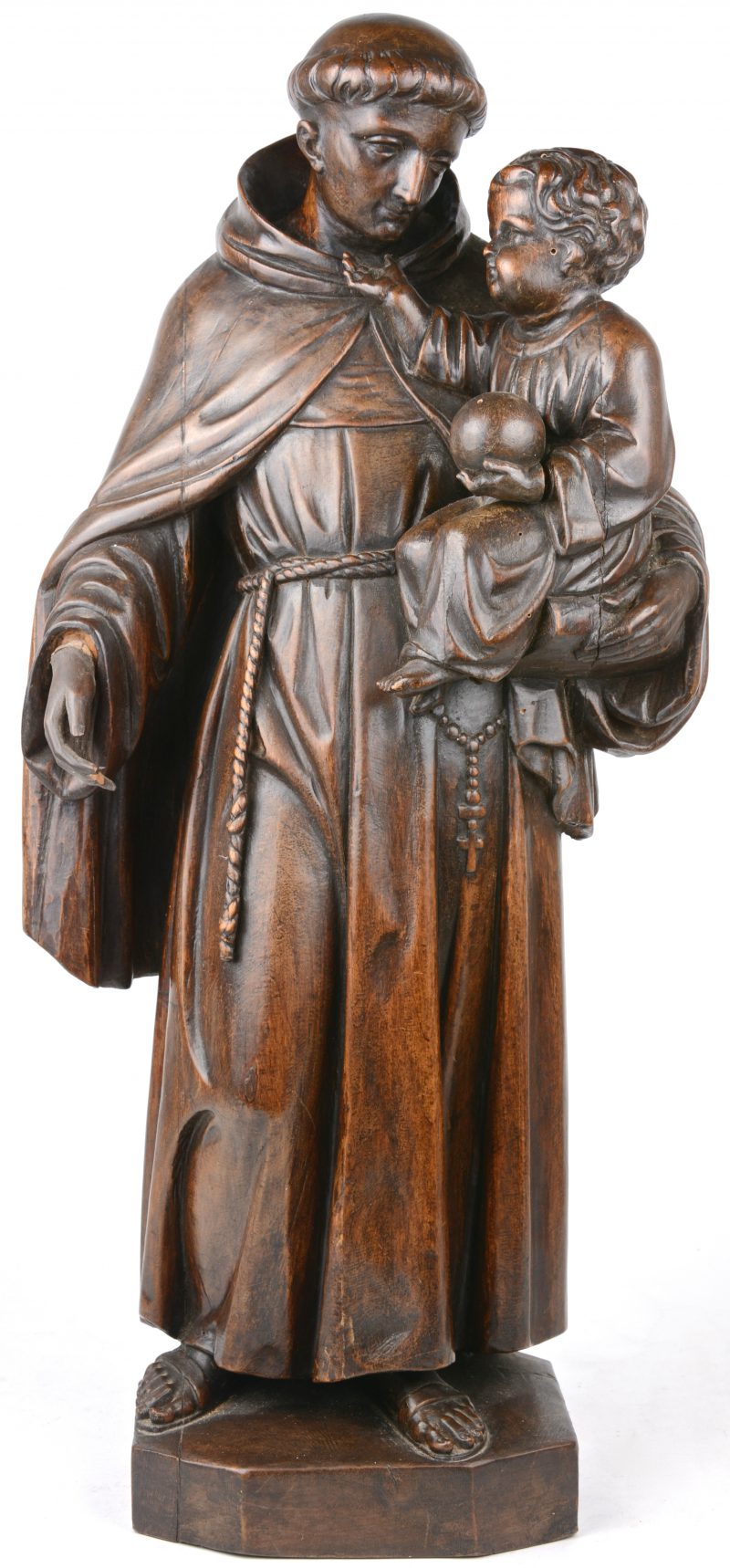“Sint Antonius en Jezus”. Een houten beeld.