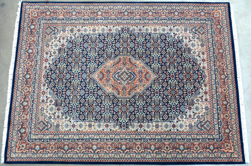 Een Indisch wollen tapijt.