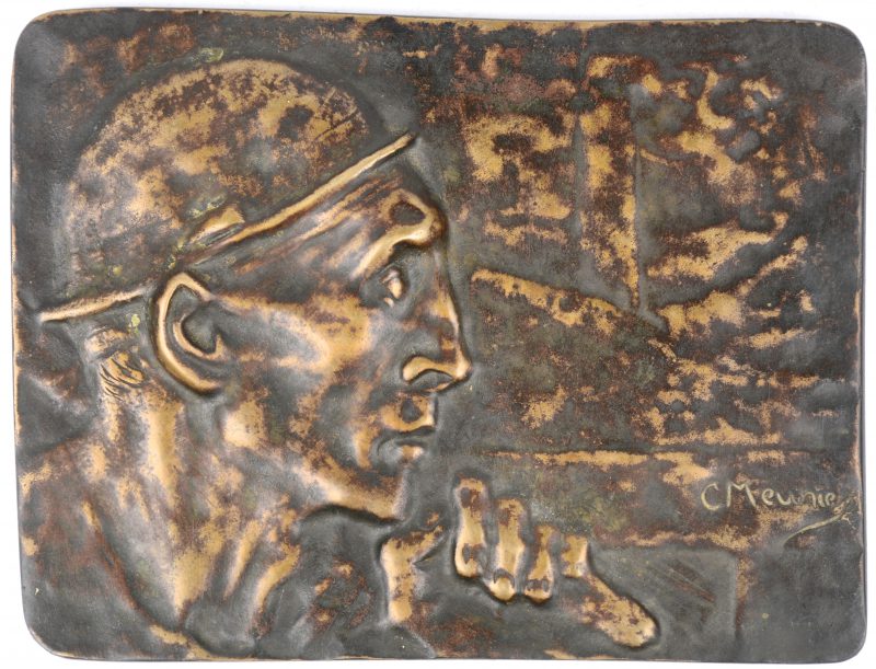 “De mijnwerker”. Een bronzen plaquette. Gesigneerd.