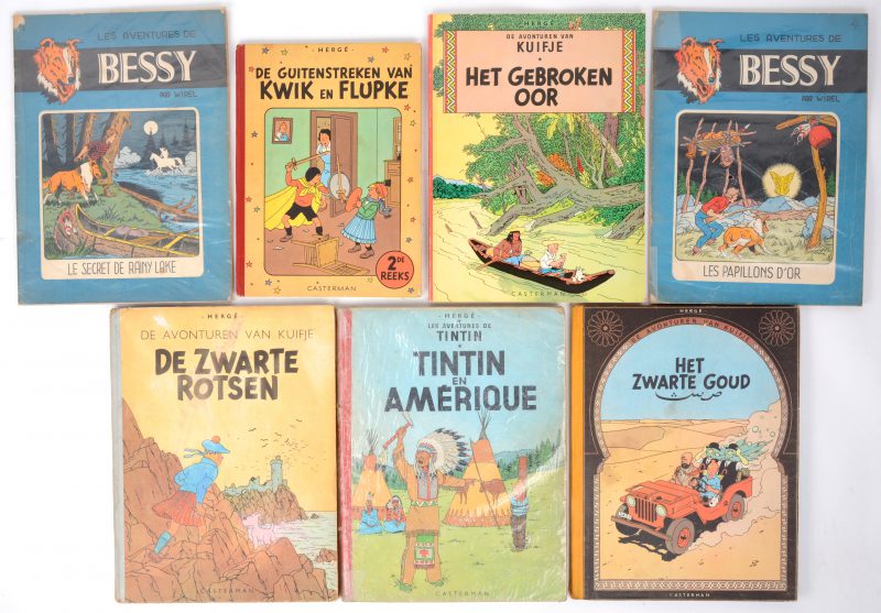 Een lot van 7 strips, bestaande uit: Tintin en Amérique, De Zwarte Rotsen, Het Zwarte goud, Kwik en Flupke 2de reeks, Het Gebroken Oor, en twee albums van Bessy.