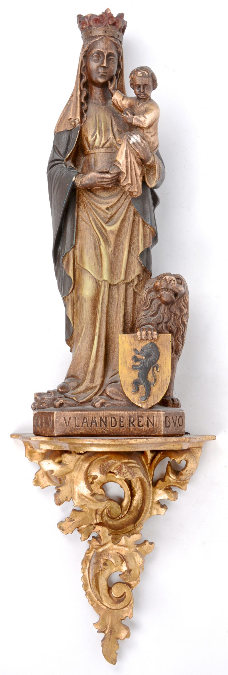 “O.L.Vrouw van Vlaanderen”. Gipsen beeld op gebeeldhouwde en vergulde sokkel in rococostijl.
