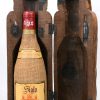 Een gebeeldhouwd houten flessenhouder in de vorm van een monnik.