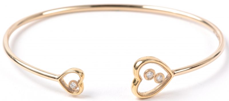 Een 18 karaats geel gouden armband bezet diamanten met een gezamenlijk gewicht van ± 0,12 ct. Naar een model van Chopard.