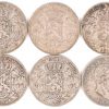 Een lot verschillende zilveren munten. Waaronder Victorio Emanuele van 5 Lire. 1874. 900‰. 25 g. En 21 munten van Leopold II. 5 frank. 900‰. 9 van 1873. 2 van 1874. 6 van 1870. 2 van 1869. 1 van 1869 met F. en 1 van 1868.
