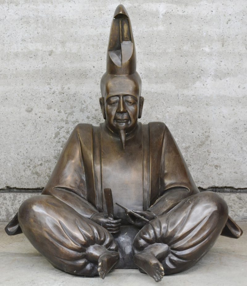 “Schrijver”. Een Japans bronzen beeld.
