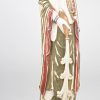 “Keizer en Keizerin”. Een paar beelden van gesculpteerd en gepolychromeerd ivoor. Onderaan gesigneerd. Met houten sokkels. Omstreeks 1930.