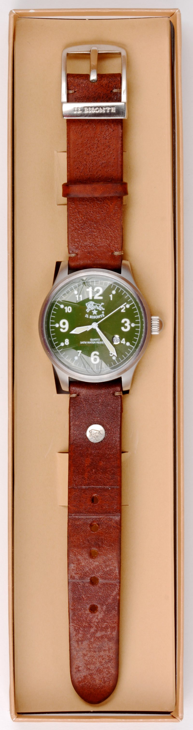 Een roestvrij stalen horloge met bruin lederen polsband in originele doos.
