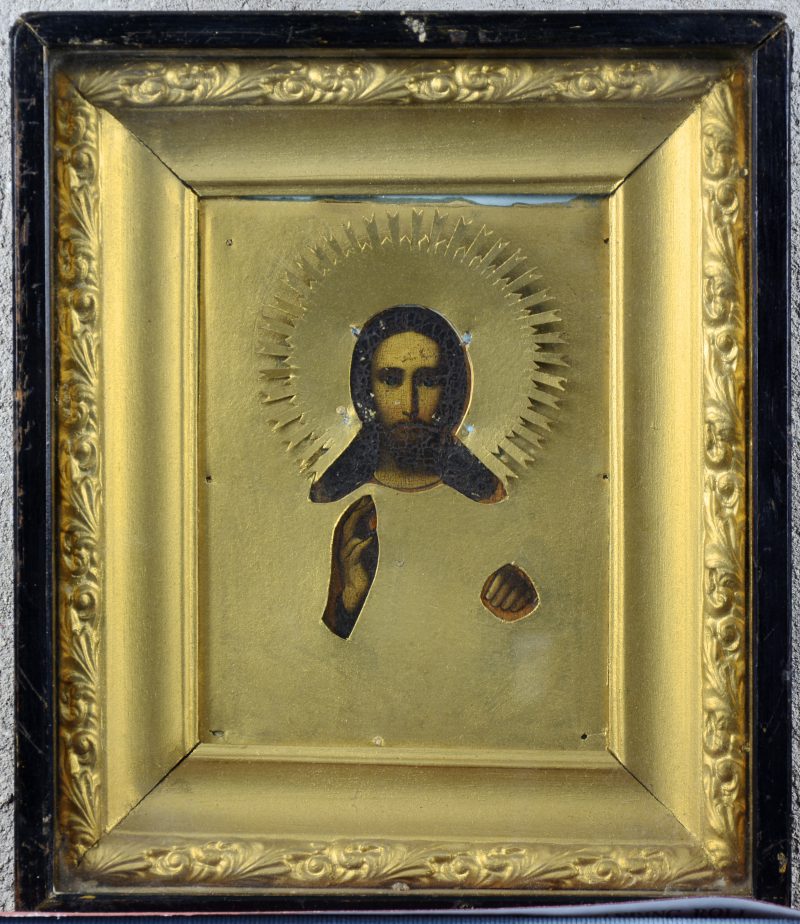 Een Oekraïnsche icoon met een voorstelling van Christus. XIXe eeuw. Achter glas.