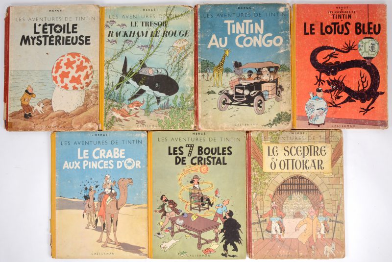 “Tintin”. Zeven albums in zeer gelezen staat. Harde covers.