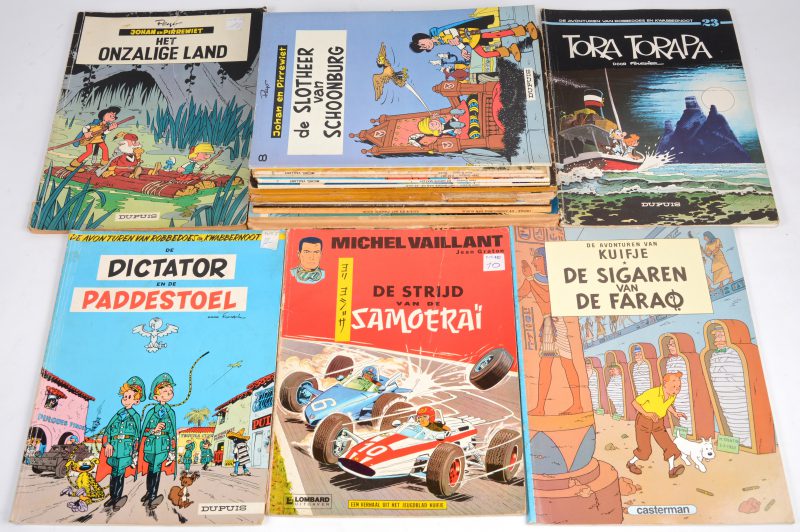 Een lot diverse oude stripverhalen. 14 stuks, in diverse staten. Franstalig en Nederlandstalig.
