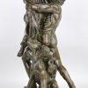 “Sater & nimf”. Een bronzen beeld naar een werk van Pierre Le Faguays. Op marmeren sokkel.