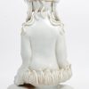 “Zittende Guan Yin op een olifant”. Een beeld van monochroom wit porselein in de stijl van het Blanc-de-Chine.