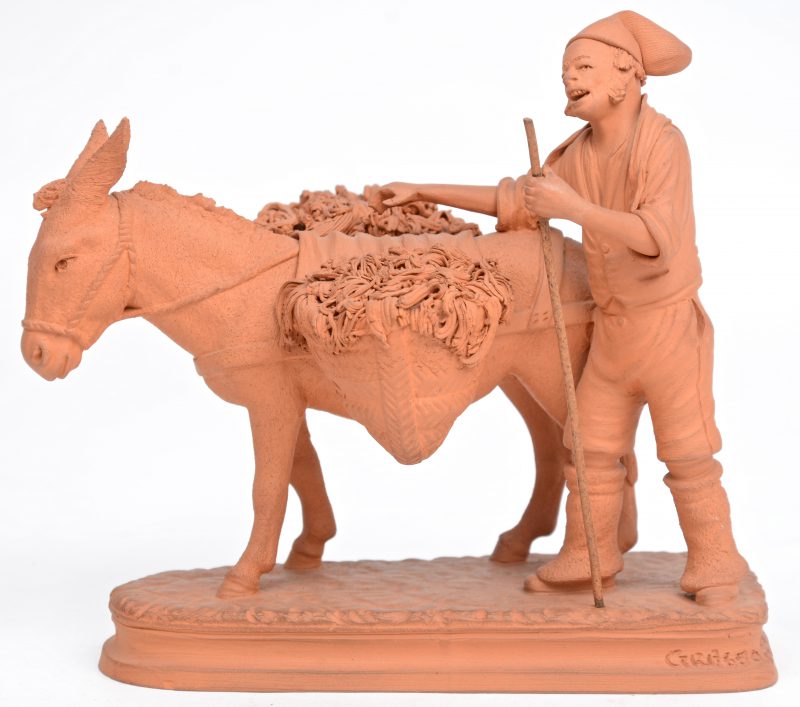 “Man met ezel”. Een groepje van terracotta.