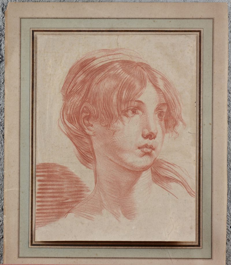 “Meisjesportret”. Een sanguinetekening. Franse school, XVIIIe eeuw.