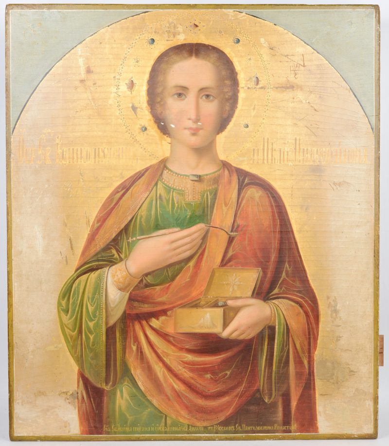 Russische icoon met Sint-Panteleimon, de Genezer. Een tekst onderaan