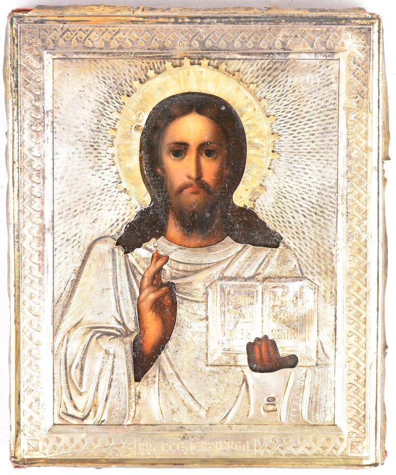 “Christus Pantokrator”. Een Russische icoon met zilveren riza. Poinçons zo goed als onleesbaar.