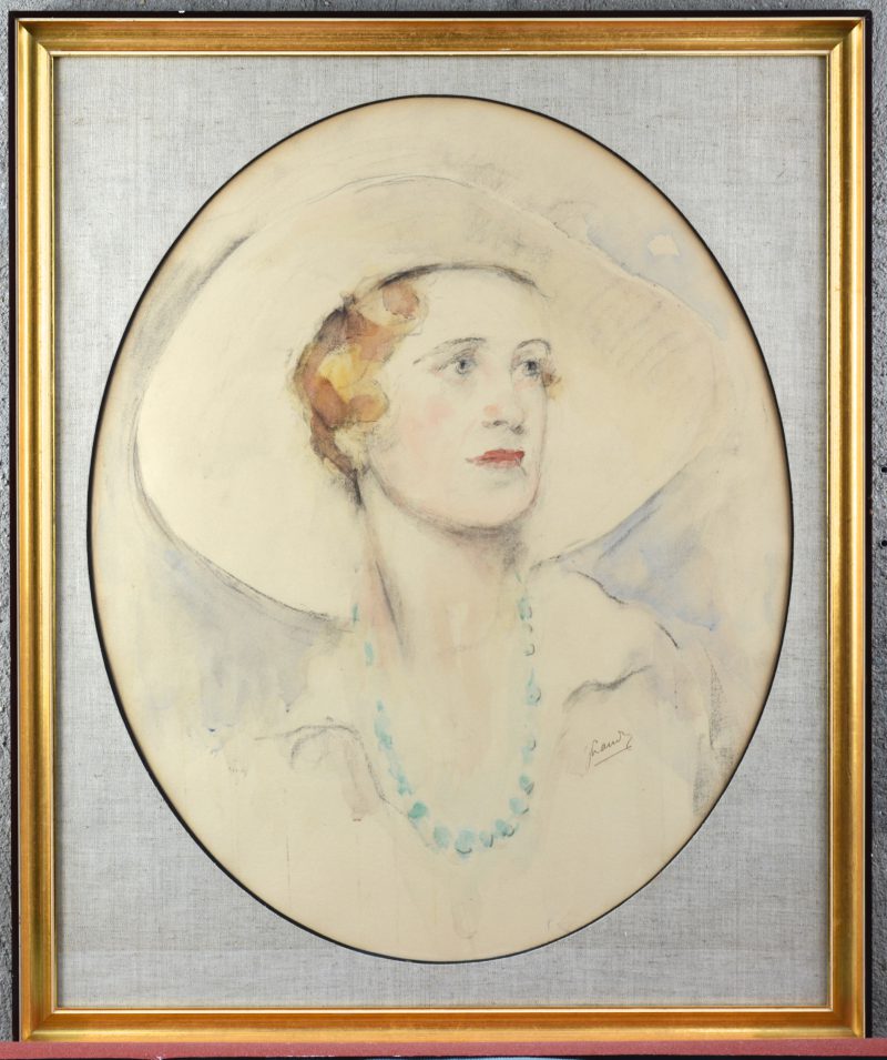 Een damesportret in houtskool en kleurkrijt. Gesigneerd. Begin XXste eeuw.