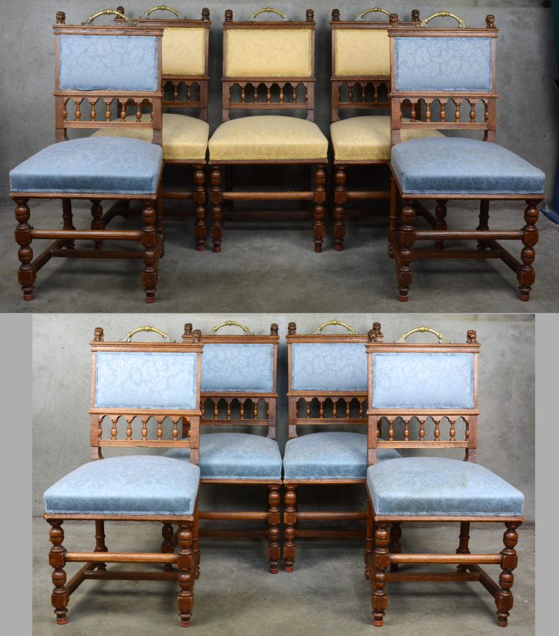 Een reeks van negen eikenhouten stoelen in Henri II-stijl.