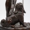 “Jonge edelman met hond”. Een bronzen beeld op arduinen sokkel naar een werk van Charles Anfrie.