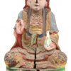 Een paar antieke gepolychromeerde houten Boeddhistische beeldjes.