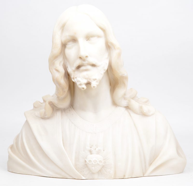 “Christus Heilig Hart”. Een gebeeldhouwd albasten buste. gesigneerd.