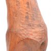 “Zittende vrouw.” Een beeld van gesculpteerd notenhout.