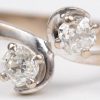“Toi et Moi”. Een 18 K witgouden ring bezet met diamanten met een gezamenlijk gewicht van +- 0,40 ct.