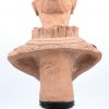 “Buste van een jonge vrouw”. Terracotta. Gesigneerd en gedateerd 1885. Op houten sokkel.